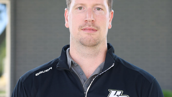 James Ryan is a high-level hockey coach and player development specialist with experience across NCAA Division, United States Hockey League, and Tier 1 AAA.
A St. Louis native, Ryan played AAA hockey for the Jr. Blues and an independent AAA program before his career was cut short at age 14 following a cancer diagnosis. After a year of chemotherapy and radiation, he made the transition from pursuing playing to coaching—committing to helping athletes reach their full potential.
Ryan comes from a strong professional coaching lineage, including his grandfather Buddy Ryan, uncles Rex Ryan and Rob Ryan, and cousin Seth Ryan.
He began as a video coach with the Miami RedHawks before moving to Buffalo’s Academy of Hockey, working in high-end player development daily and helping coach/ run the Jr. Sabres organization. He then advanced to the Muskegon Lumberjacks of the USHL, serving as Head Skill Development and Video Coach before being promoted to assistant coach. There, he transformed the team’s penalty kill from 67% (worst in the league) to 90%(best in the league) over the remainder of the season and playoffs.
After stepping away briefly to address health issues related to his cancer battle, Ryan returned to coaching with the HoneyBaked Hockey Club, where he also runs on-ice skill development for the Athlete Academy.
In 2026, Ryan led his 16U team to a MAHA State Championship(a month after taking over as head coach)—the highlight of his career to date—guiding a short-benched group of 13 skaters through adversity and into a deep National Tournament run.
Ryan’s approach emphasizes elite skill development, accountability, and building resilient, team-first athletes, all while having fun doing it.